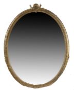 Victorian oval wall mirror, the gilt gadrooned frame with shell and acanthus leaf pediment, 102.