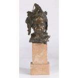Bronze bust depicting a young girl with stylised leaves in her hair, on a marble plinth base, 34cm