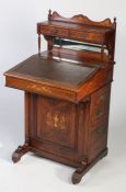 Late Victorian rosewood and boxwood inlaid davenport, having a two drawer and mirrored gallery,