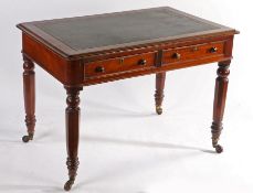Victorian mahogany writing table, the green leather and gilt tooled inset top above a pair of