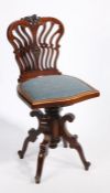 Victorian mahogany cello chair, the pierced scrolled cresting rail and back above an upholstered