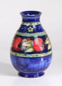 1930's Moorcroft vase, the flared neck above an ovoid body with central band of pomegranates and