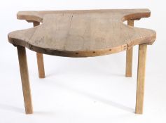 Early 20th Century Paris jewellers table, the dished table top with curved edge and two arched