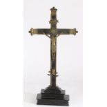 18th/19th century bronzed and ebonised Corpus Christie, the ebonised cross set with bronzed caps and