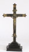 18th/19th century bronzed and ebonised Corpus Christie, the ebonised cross set with bronzed caps and
