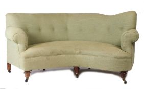 Edwardian parlour settee, upholstered in a woven green fabric, the shaped button back above a curved