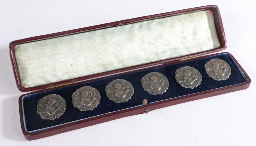 Set of six continental Art Nouveau silver buttons, with cast decoration depicting a young lady