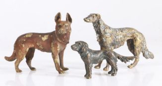 Three Austrian cold painted bronzed studies of dogs, the largest 8cm wide (3)