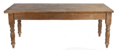 Victorian pine refectory table, the rectangular plank top above turned legs and plain stretchers,