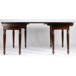 George III mahogany campaign style dining table, the rectangular top with reeded edge and rounded