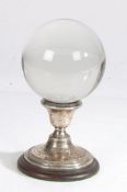 A crystal ball on associated silver and wood stand, Henry Clifford Davis, Birmingham, 1886, possibly