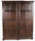 Large oak cupboard made from panels taken from the Apothecaries' Hall in London circa 1920's, the
