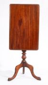 Victorian mahogany occasional table, the rectangular tilt-top with bevelled edge, raised on a turned
