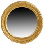 19th century gilt convex wall mirror, with reeded and beaded border, baring label to verso 'E.B.