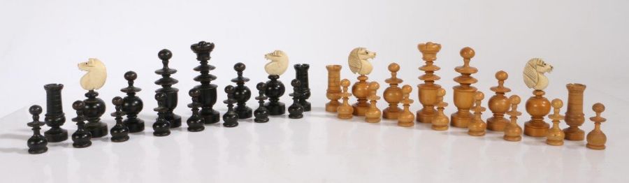 A Regence pattern chess set, French late 19th century, turned boxwood and ebony pieces with carved - Image 3 of 4