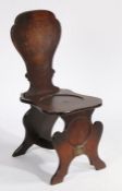 Victorian mahogany hall chair, with scrolled splat back, solid dished seat, raised on silhouette