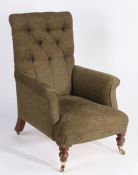 19th century mahogany and upholstered armchair, with a buttoned back above a pair arms and a deep
