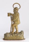 19th Century brass doorstop modelled as a beggar holding a cup and walking stick, 33.5cm high,
