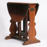 Early 20th Century bog oak drop-leaf table, the rectangular top with two D shaped drop leaves,