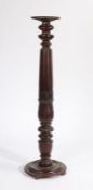 Edwardian mahogany torchere stand, the dished top raised on a reeded and acanthus leaf carved stem