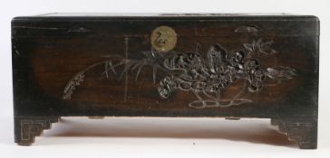 Chinese camphorwood chest, 20th century, carved with figures, pagoda's and flowers, 119cm long, 52cm
