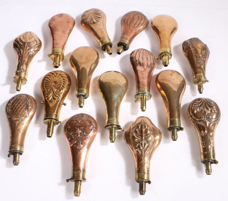 Collection of fifteen 19th Century copper and brass powder flasks, to include acanthus leaf,