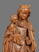 A Medieval finely carved limewood figure of the Madonna & Child, French, circa 1350-1420 The