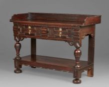 A rare and fine Charles II oak serving table, Cheshire/South Lancashire, circa 1660 Having a twin-