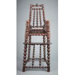 A rare and interesting Charles II turner's solid-walnut child's high chair, circa 1660 With four