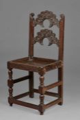 A rare Charles II oak backstool, Yorkshire/Lancashire, circa 1660 The back with two arched and