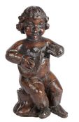 An Elizabeth I/James I walnut carved putti, circa 1590-1620 Carved in the round, designed seated