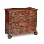 A good Charles II solid-walnut chest of drawers, circa 1660-80 The top of two boards with ovolo-