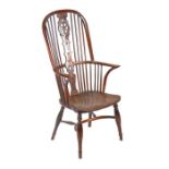 A particularly tall yew Windsor armchair, Buckingham, circa 1800-40 The hooped back with scribed