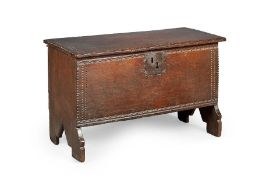 A small  Elizabeth I oak boarded chest, circa 1580-1600 Having a one-piece top, the top and front