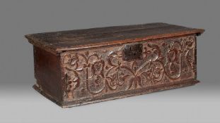 A Charles I oak boarded box, in the Elizabethan manner, Derbyshire, circa 1640 The hinged lid having