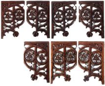 Seven mid-15th century oak pierced tracery-carved panels, Norfolk, England, circa 1450 From a rood