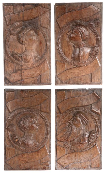 An interesting set of four Henry VIII oak Romayne-type family portrait panels, English, probably