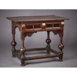 An unusual Charles II oak, elm and snakewood side table, East Anglia, circa 1660 Having a twin-