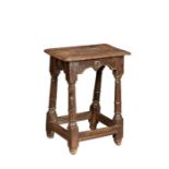 An extraordinarily rare Elizabeth I/James I oak joint stool, circa 1600-20 Having a six-pegged