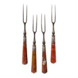 A set of four steel, silver and agate forks, circa 1700 Each with two-tines, baluster stem, silver