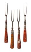 A set of four steel, silver and agate forks, circa 1700 Each with two-tines, baluster stem, silver