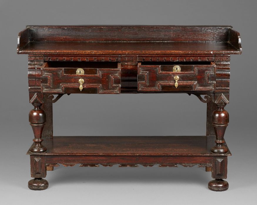 A rare and fine Charles II oak serving table, Cheshire/South Lancashire, circa 1660 Having a twin- - Image 8 of 8