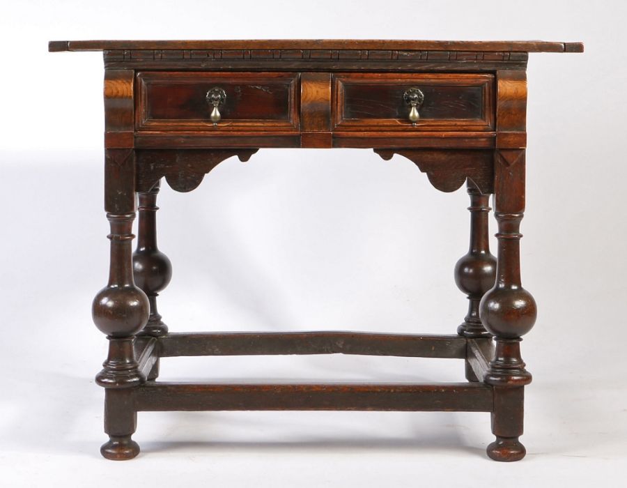 An unusual Charles II oak, elm and snakewood side table, East Anglia, circa 1660 Having a twin- - Image 7 of 8