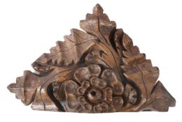 A Henry VII carved oak roof boss, English, circa 1500 Of three-quarter form, designed to fit at