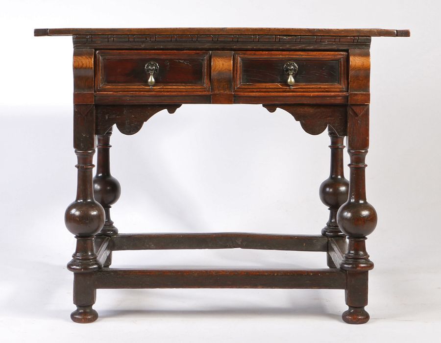 An unusual Charles II oak, elm and snakewood side table, East Anglia, circa 1660 Having a twin- - Image 5 of 8