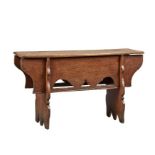 A rare Henry VIII oak boarded long stool/short bench, circa 1530-40 Having a one-piece top with