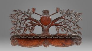 An unusual walnut pipe rack, Anglo-American, circa 1800-50 Designed as an oak tree, with leaves