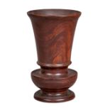 A fine and large turned lignum-vitae urn, English, circa 1820-40 Having a flared drum, on a squat-