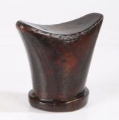 Ethiopian Oromo headrest, of block form, with incised linear decoration, 14cm wide, 14cm high