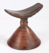 Ethiopian Oromo headrest, the conical base with traces of red banded decoration, 15cm wide, 15cm